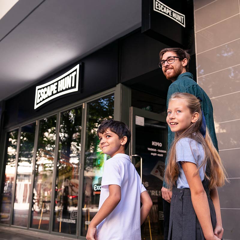 Teacher and two pupils entering an Escape Hunt