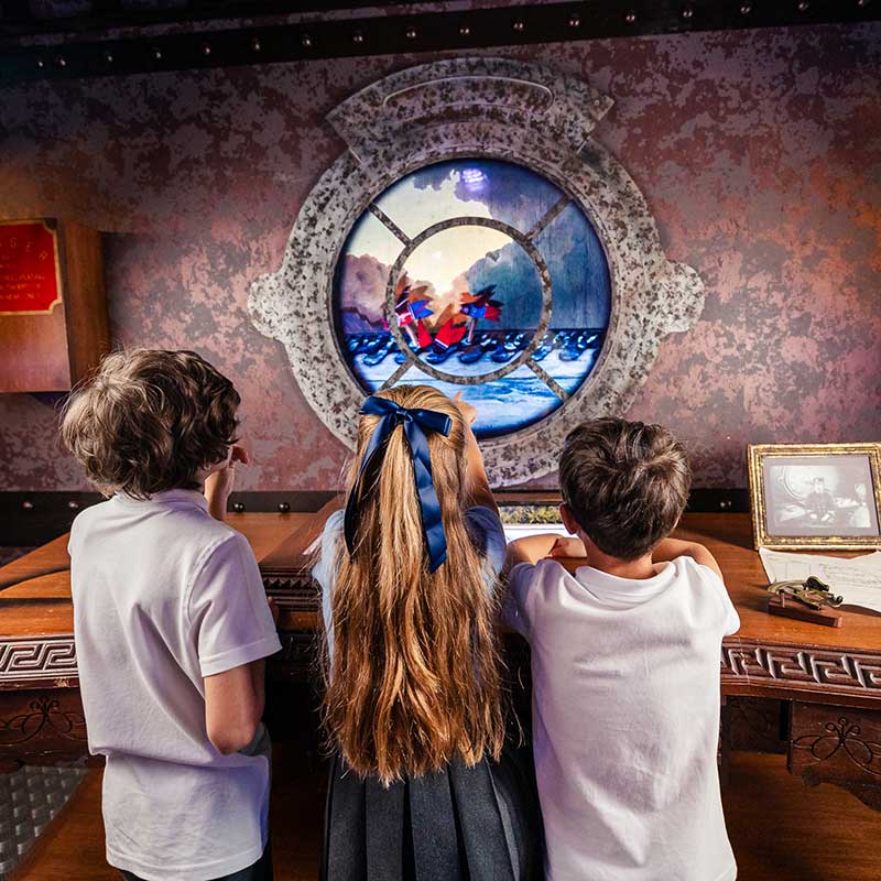3 school children playing an escape room game