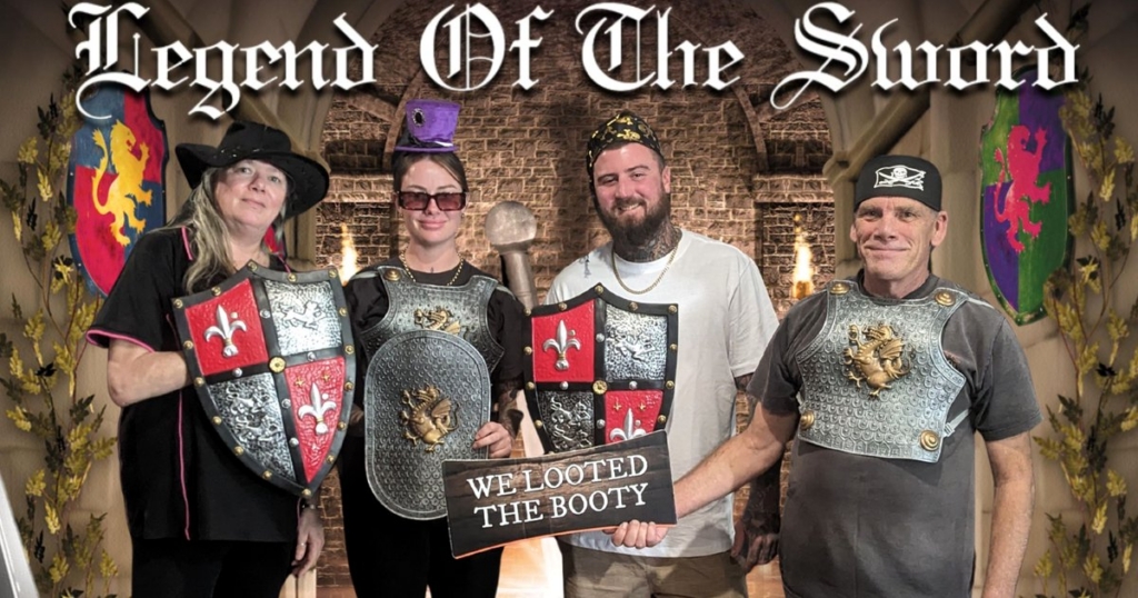 Work team celebrating an escape room win at Escape Hunt Fremantle