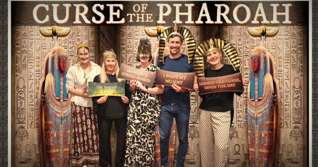 Group in costume in the Curse of the Pharaoh escape room at Escape Hunt Fremantle